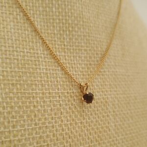 Elegant Gold Necklace with red Pendant plated most likely